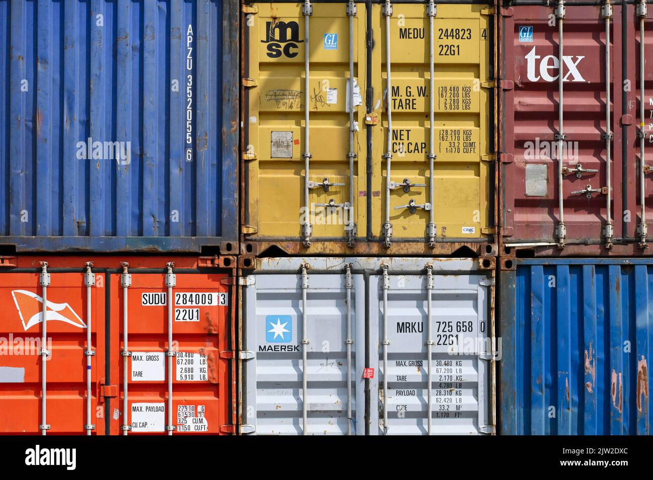 Stacked freight containers Stock Photo - Alamy