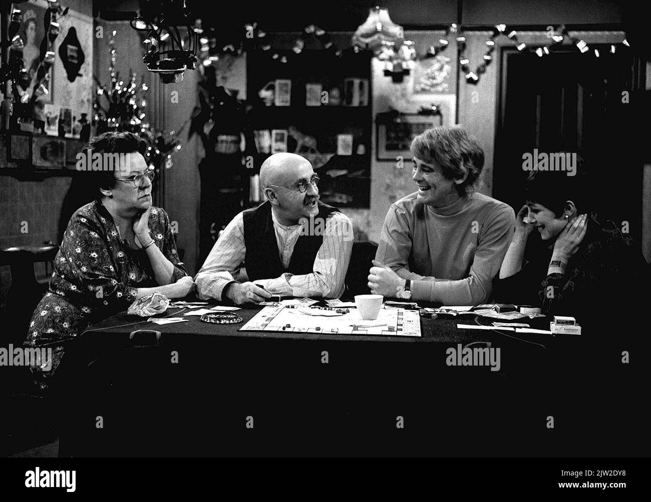 Undated file photo of (left to right) Dandy Nichols, Warren Mitchell, Tony Booth and Una Stubbs during rehearsals for the BBC show Till Death Us Do Part. That's TV has announced it will air the long-running sitcom, including four episodes which have not been seen in half a century. The popular comedy show centres around big-mouthed buffoon Alf Garnett and his reactionary opinions on everything. Issue date: Saturday September 3, 2022. Stock Photo