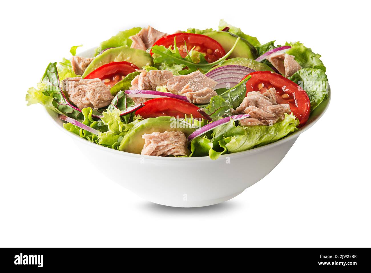 Fresh green leafy salad with tuna avocado and tomato isolated on white background. Concept for a tasty and healthy meal Stock Photo