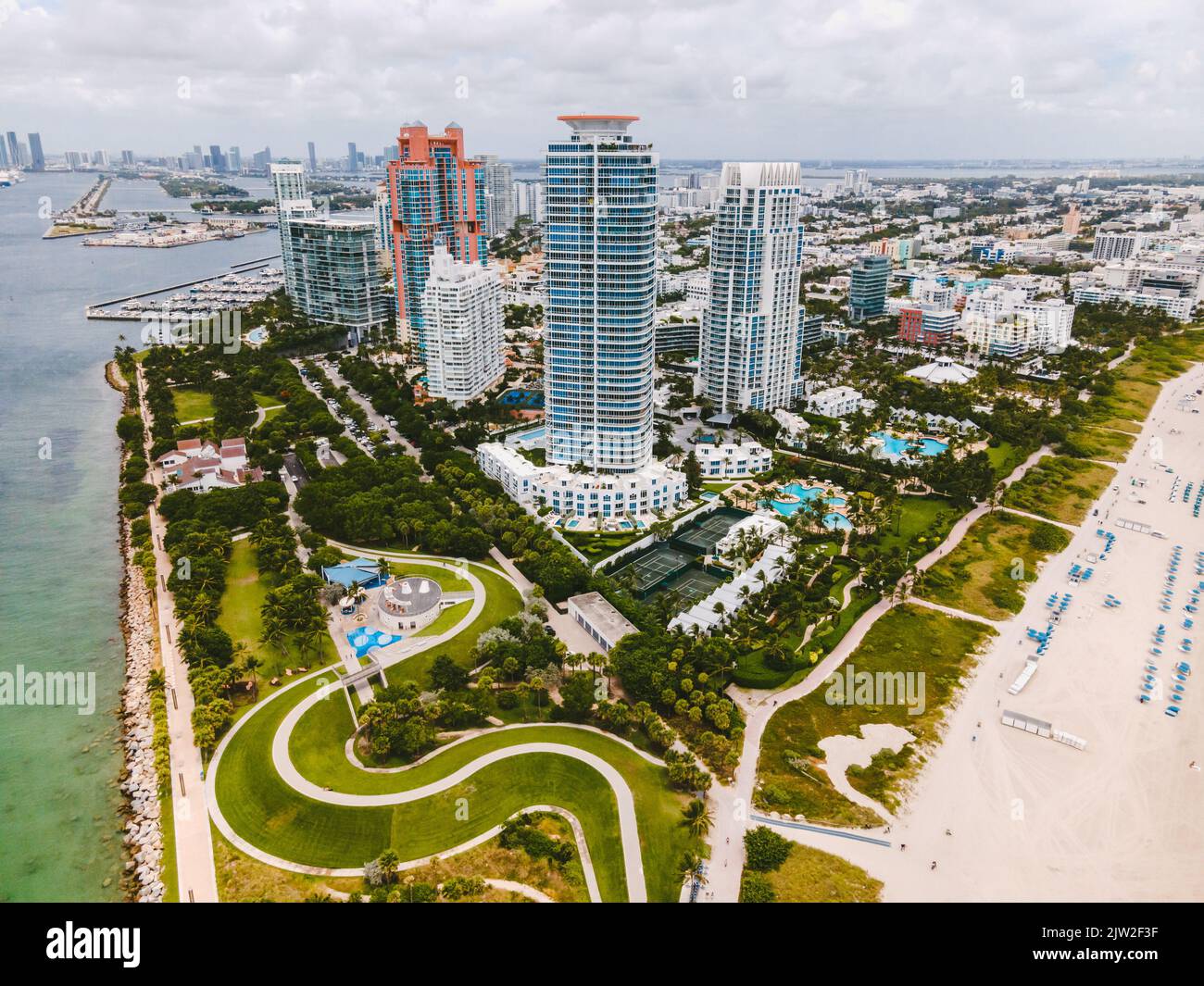 Amazing drone view of modern skyscrapers and buildings with swimming ...