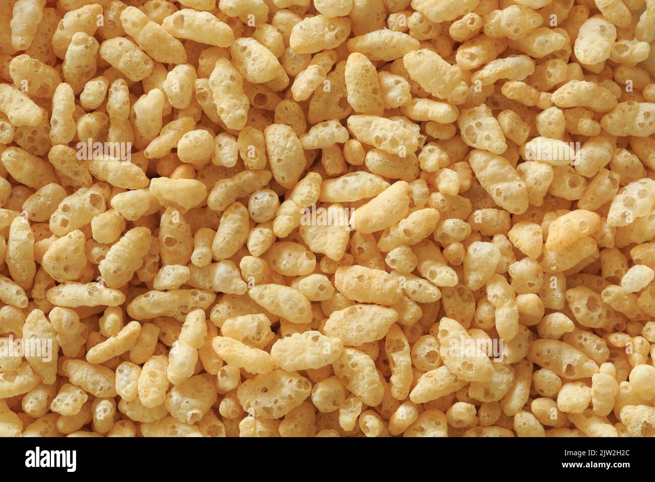 Grains of puffed rice cereal, filling the frame Stock Photo
