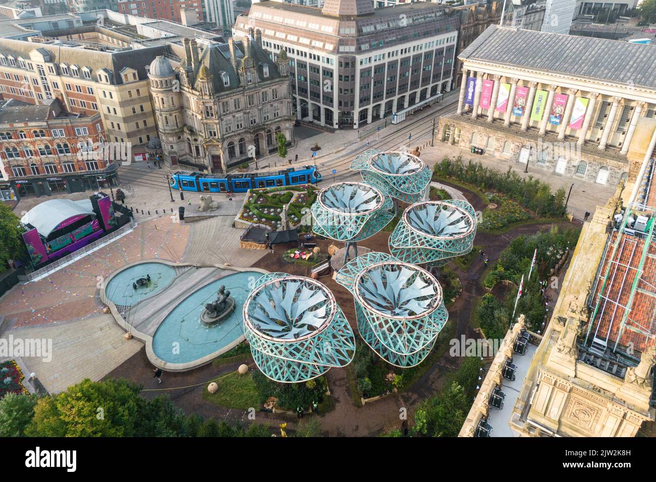 Victoria Square, Birmingham September 3rd 2022 - The Polinations installation in Birmingham's Victoria Square next to the Council House. The garden along with giant architectural trees have been created as part of the Birmingham 2022 Festival. On Saturday morning a yoga class brought in the morning sun through the mist to the sound of the 'Floozie in the Jacuzzi' fountain. Credit: Scott CM/Alamy Live News Stock Photo