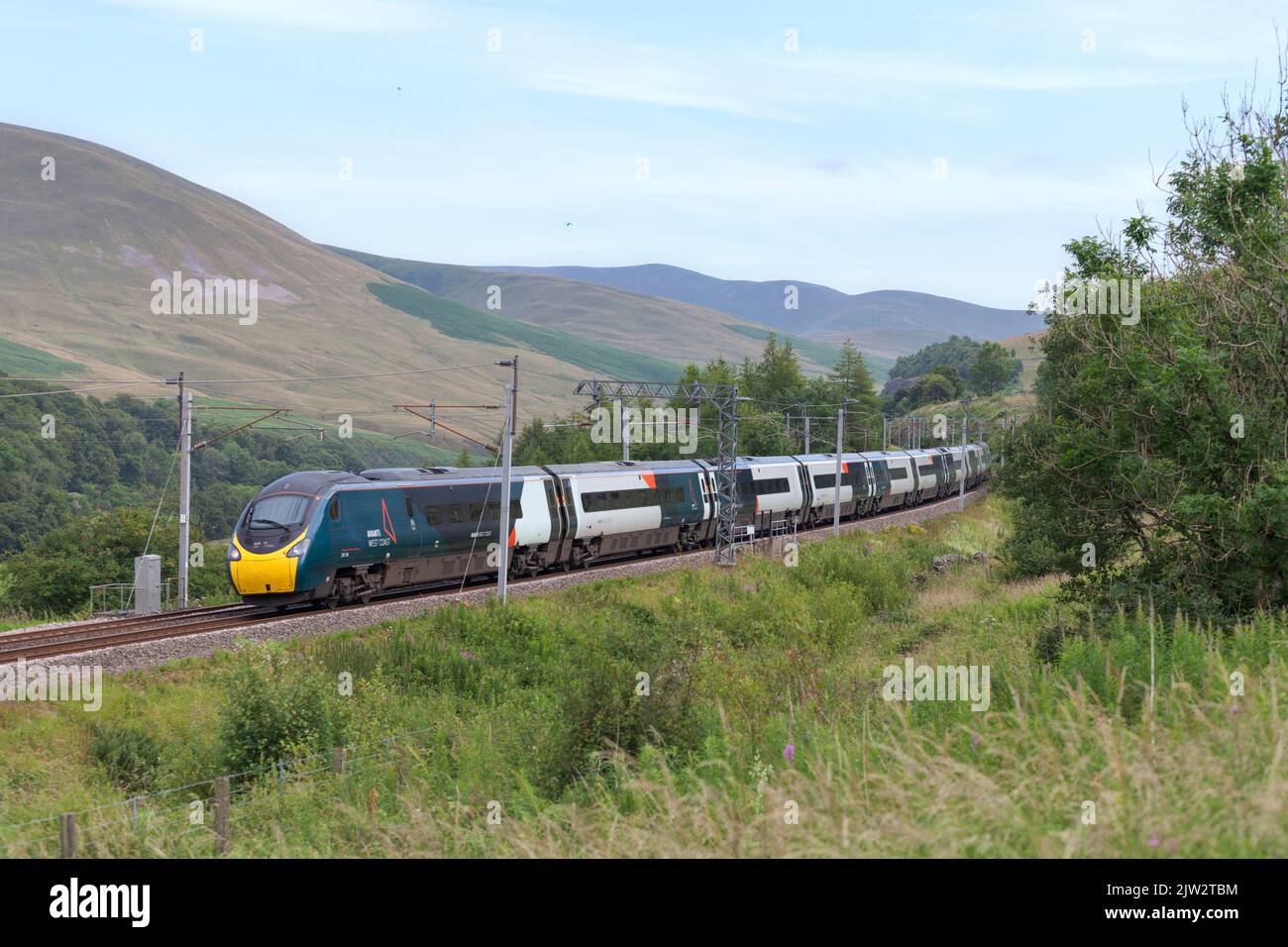 Avanti west coast Alstom pendolino train 390104 running through the ...