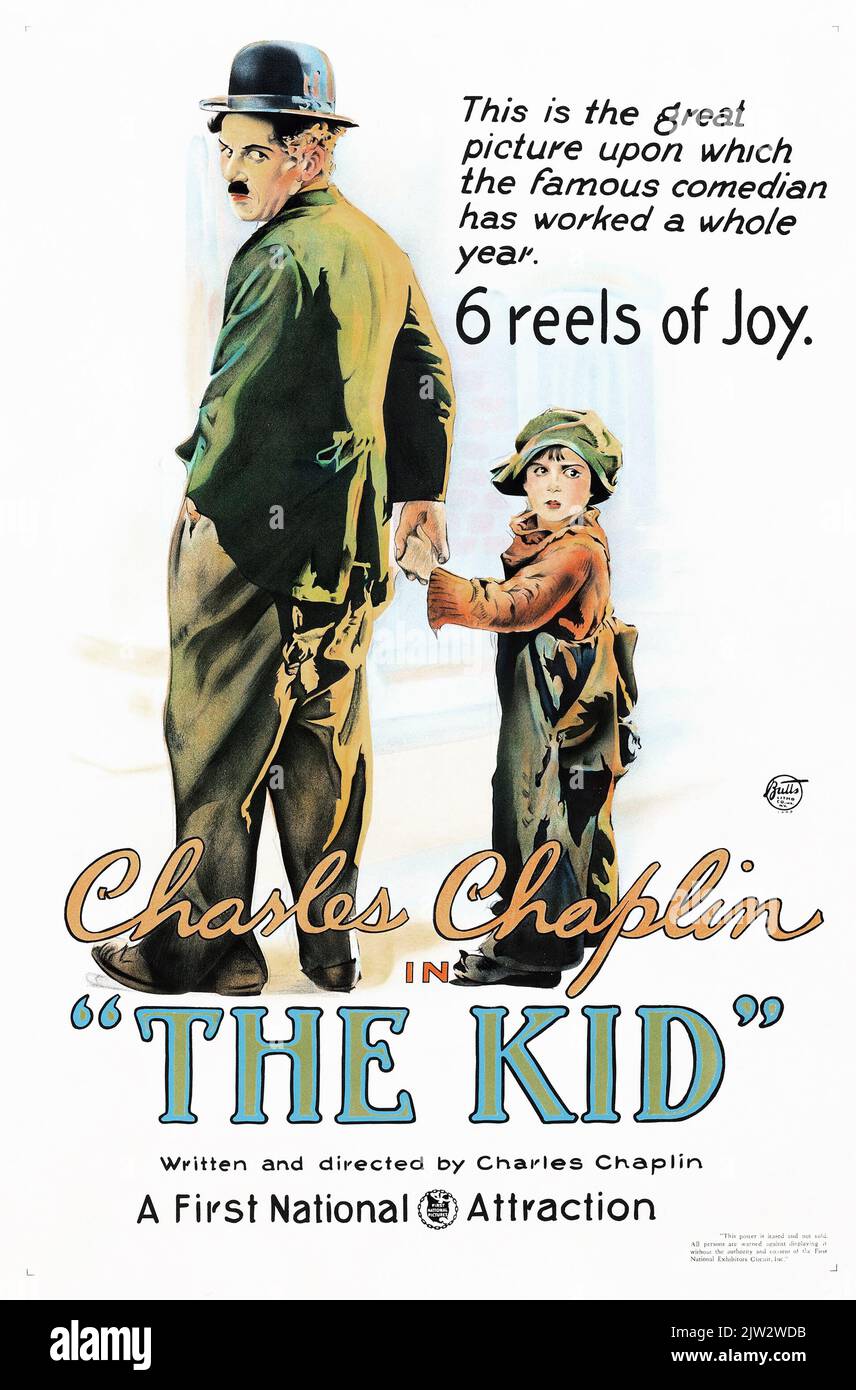 Charlie Chaplin in The Kid (First National, 1921) with Jackie Coogan. Stock Photo