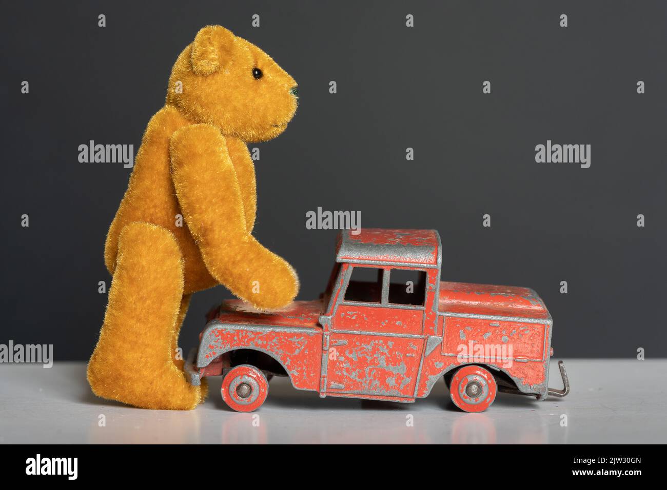 Teddy bear and old red truck Stock Photo Alamy