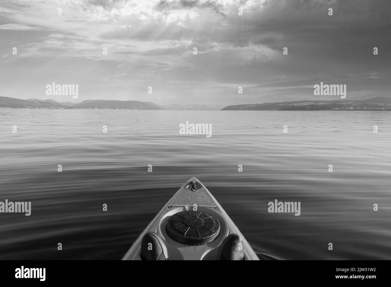 Kayak in black and white on Loch Lomond Stock Photo