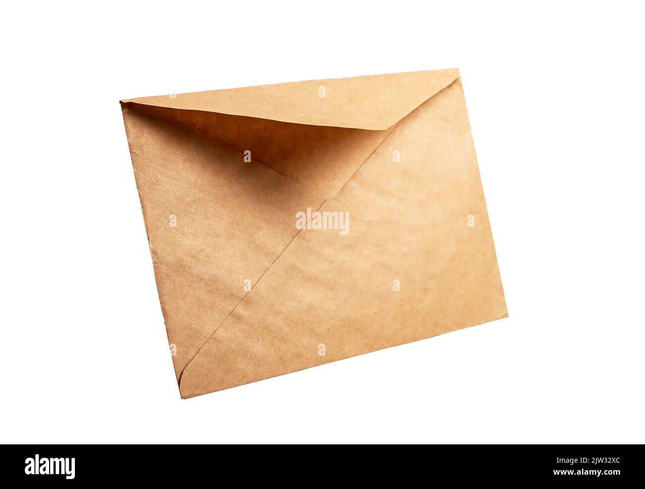 Kraft paper envelope isolated on white background. Angled view. Natural