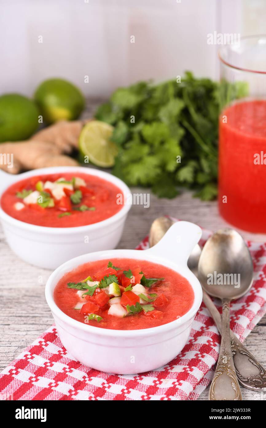 Watermelon tomato gazpacho in bowls. Traditional Spanish cold soup. Stock Photo