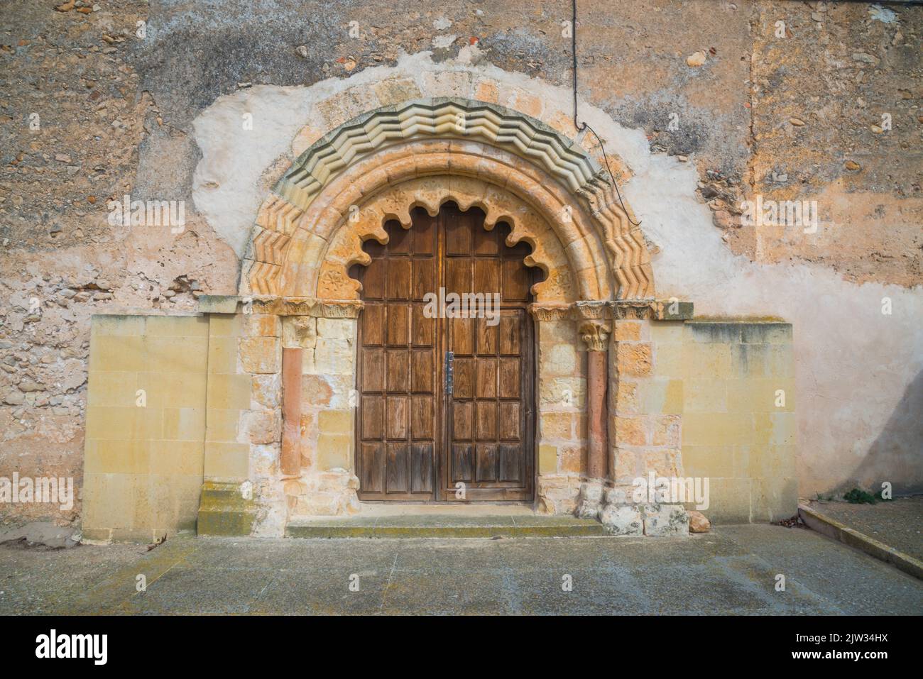 Facade of the church. El Olmo, Segovia province, Castilla Leon, Spain. Stock Photo