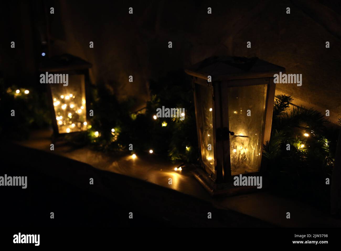 Lanterns with candles in them. Beautiful warm tone light bringing in