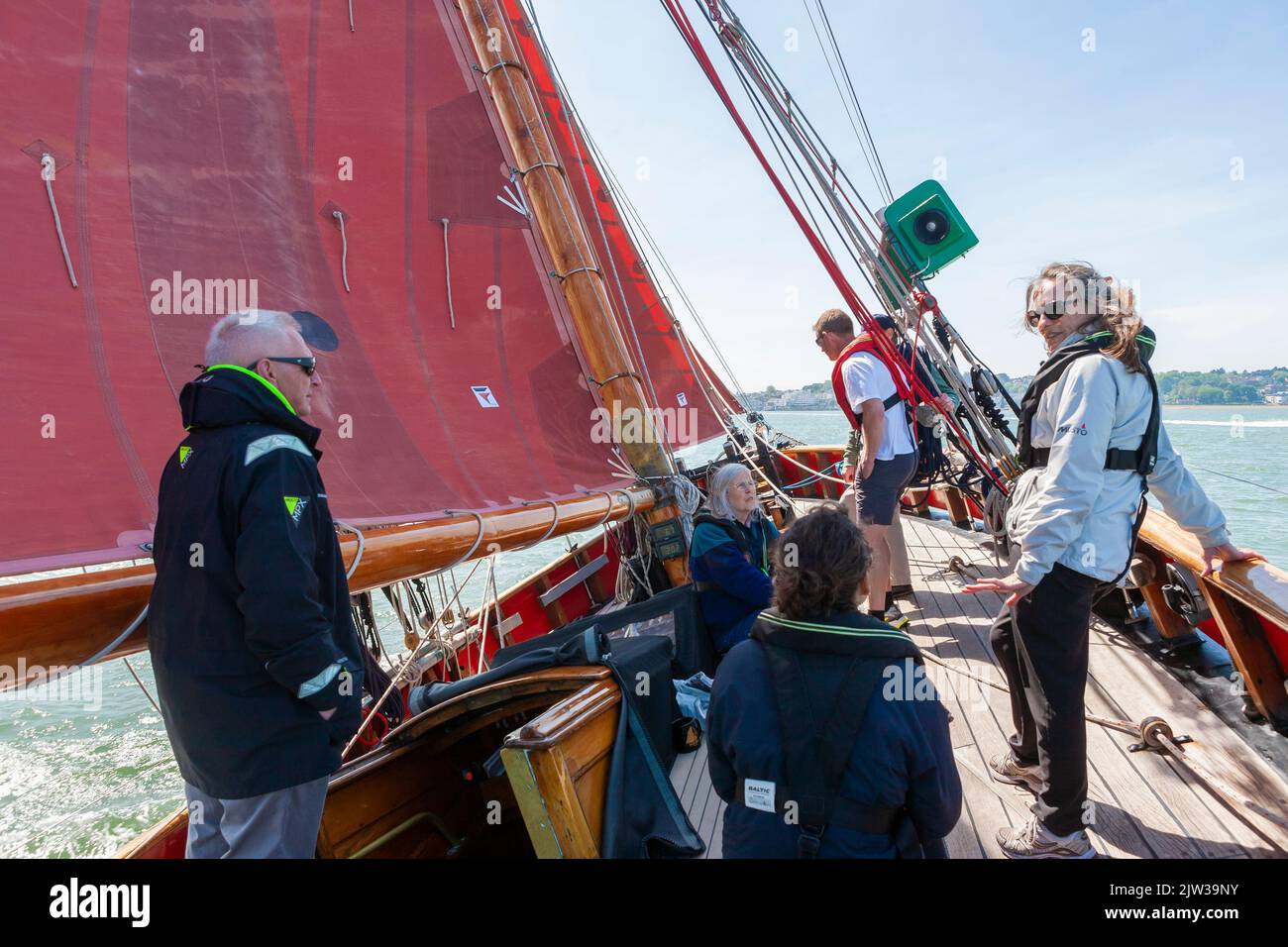 Sailing aboard the traditional gaff cutter 'Jolie Brise': Solent, Hampshire, UK Stock Photo
