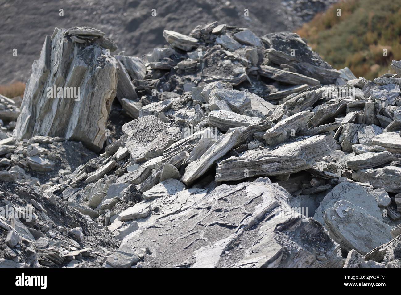 unprofitable heaped up gypsum-poor Rock slabs Stock Photo