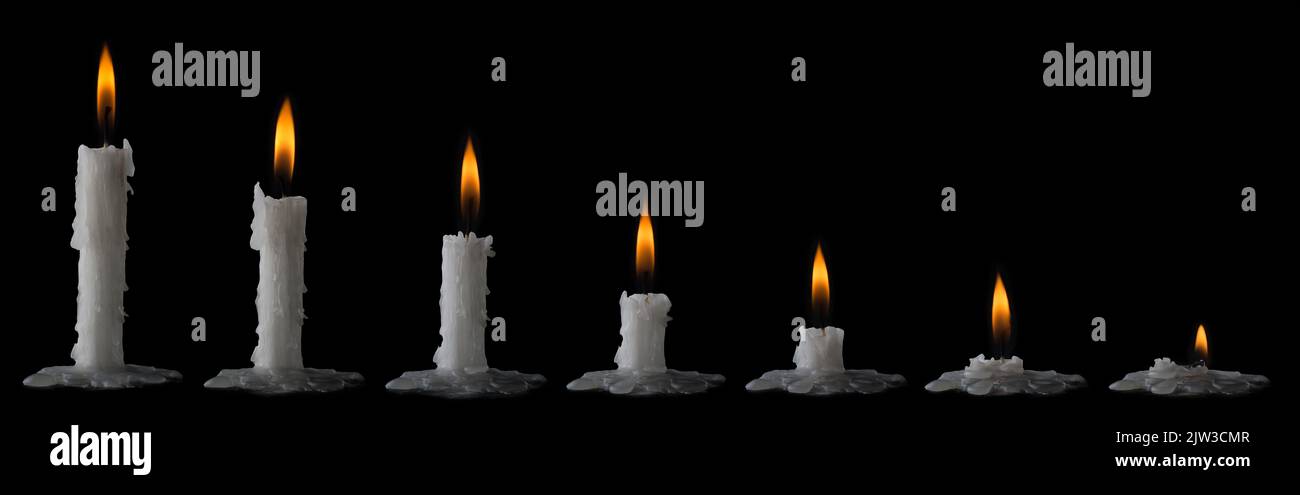 time lapse of burning wax candles isolated on black background, collection Stock Photo