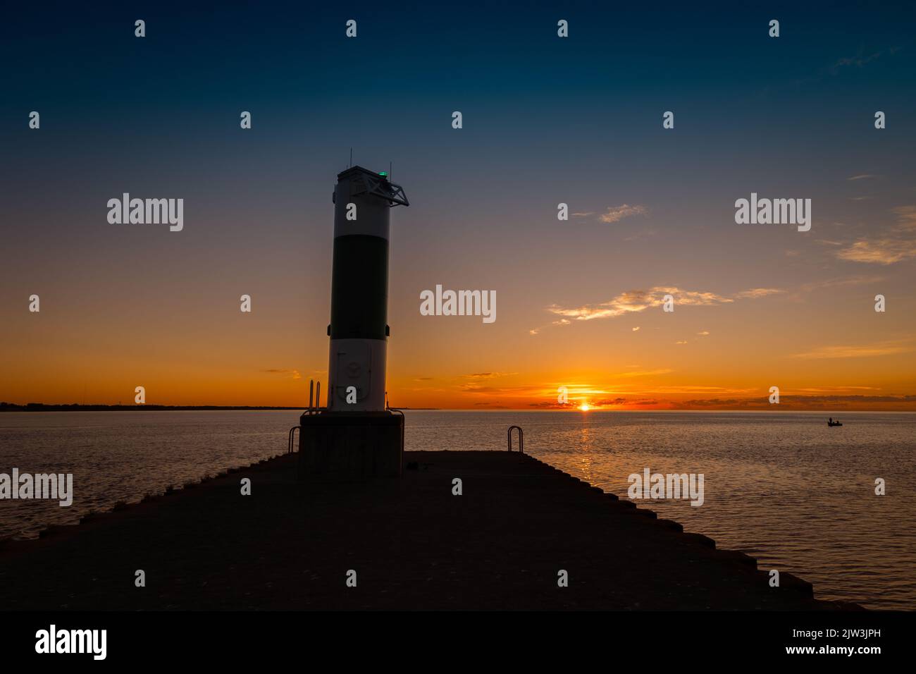 lighthouse; light; pier; navigation; building; maritime, nautical; Stock Photo