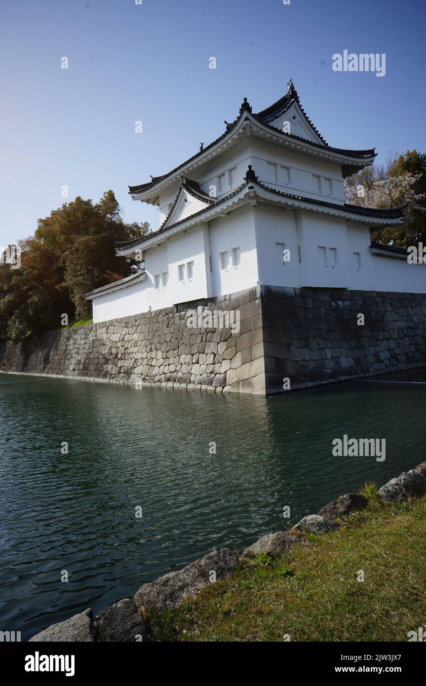 Osaka castle side tower and lake Stock Photo