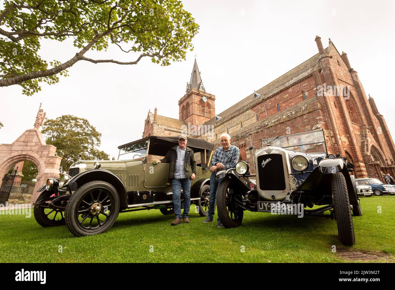 Kirkwall, Orkney, UK. Saturday, 3rd September, 2022. Vintage car owners Michael Shearer and Eddie Ratter, with a 1923 Bullnose Morris and a 1928 Austin 12 in front of St Magnus Cathedral at the Kirkwall Vintage Car Rally, Kirkwall, Orkney, UK. The Vintage Car Rally is part of the International Orkney Science Festival. Credit: Peter Lopeman/Alamy Live News Stock Photo