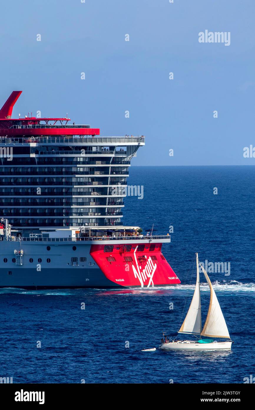 Virgin Voyages Valiant Lady cruise ship travelling in Ibiza in the Balearic Islands, Spain in summer Stock Photo