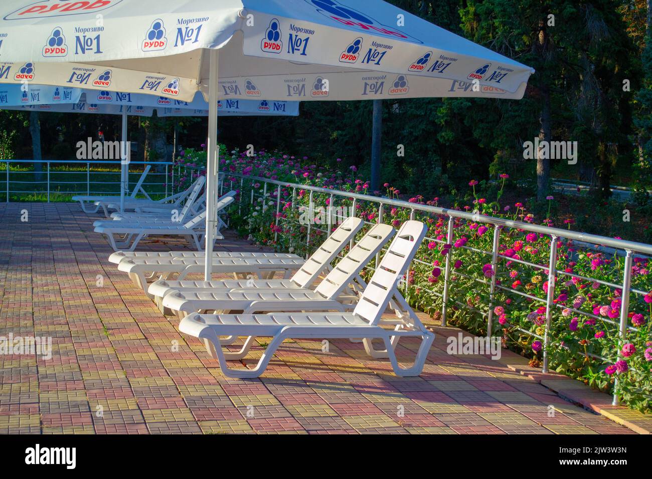 Chairs umbrella near swimming pool hi-res stock photography and images -  Page 2 - Alamy