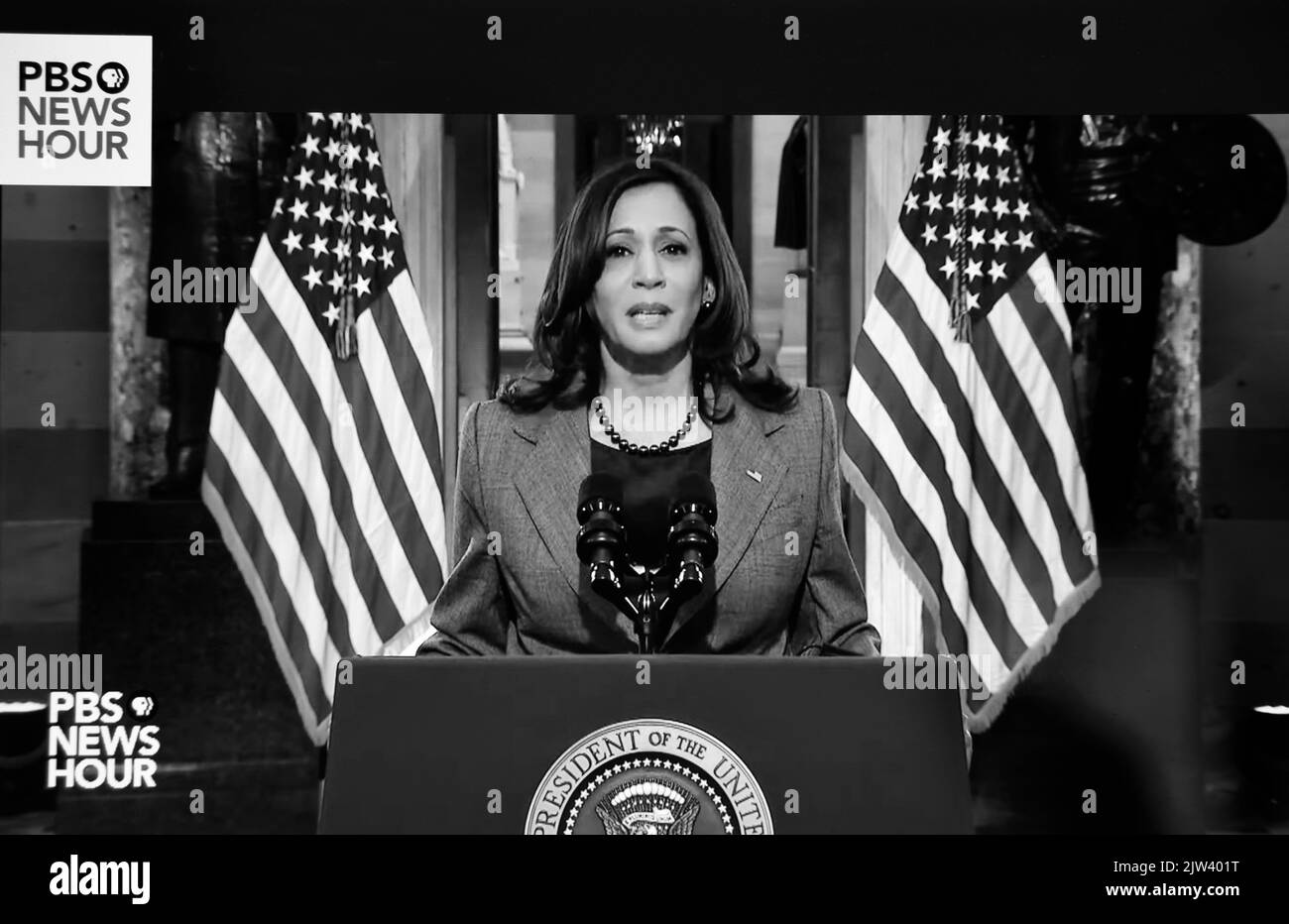 A PBS TV NewsHour screen shot of U.S. Vice President Kamala Harris speaking on the annivarsay of the January 6 attack on the U.S. Capitol. Stock Photo