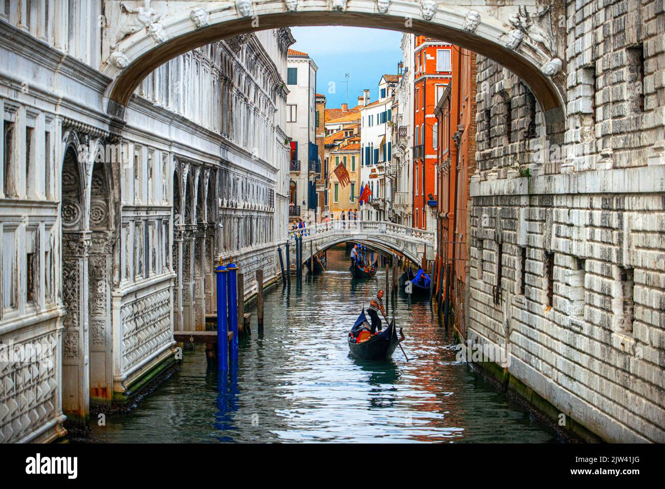 The Bridge of Sighs Ponte dei Sospiri over the Rio di Palazzo della Paglia, Venice, Italy. Ponte della Paglia, historical bridge.  Venice is slowly si Stock Photo