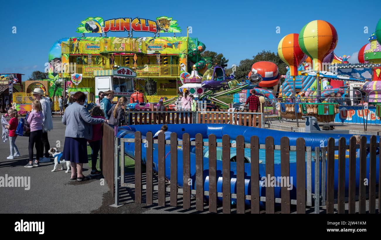 Visiting the fair, Morecambe Bay, Lancashire, UK Stock Photo