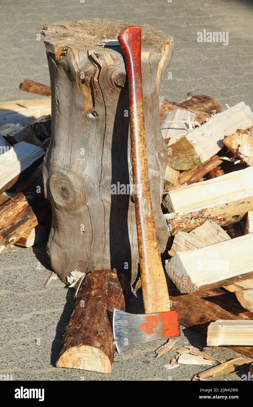 some Split firewood with ax and block Stock Photo