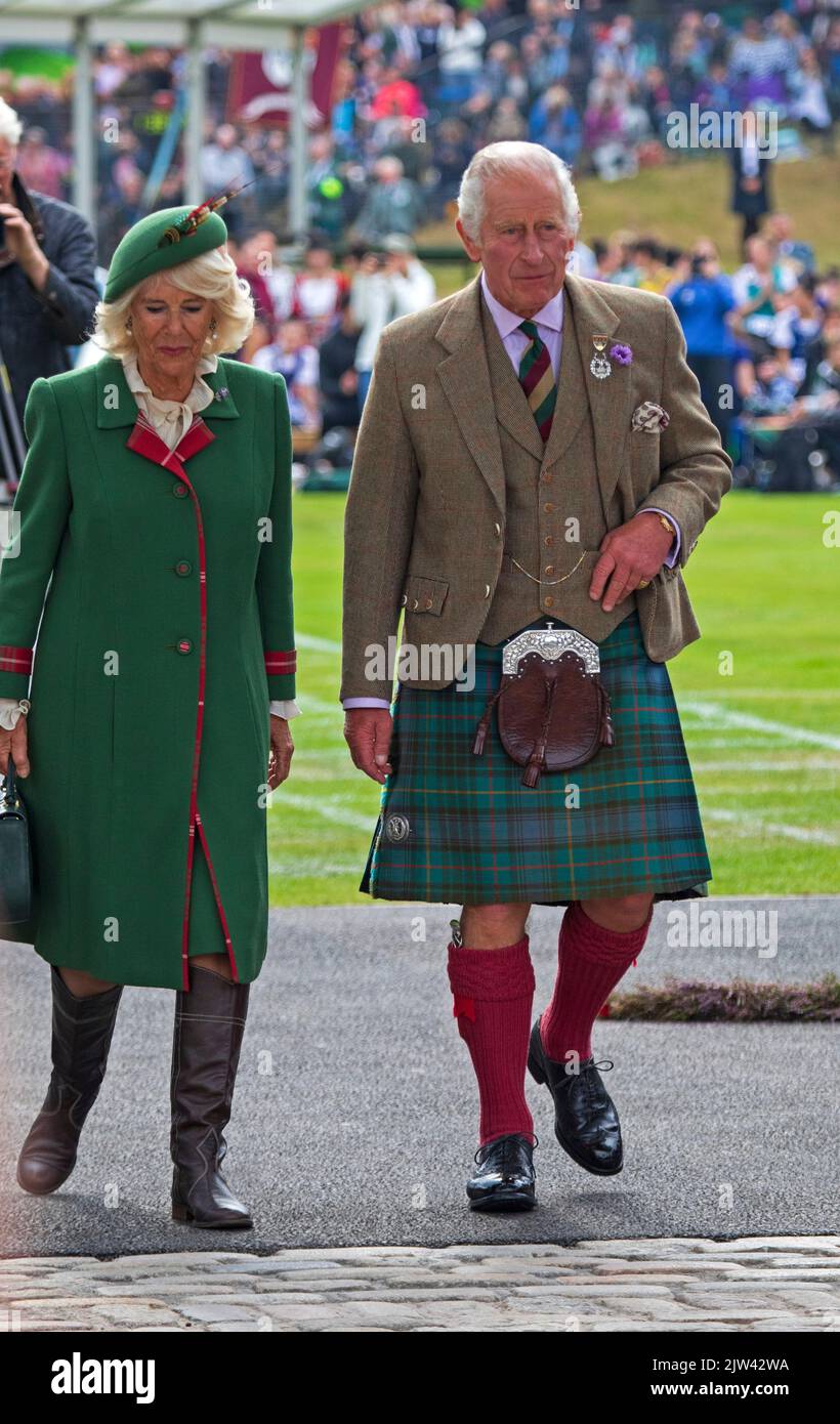 Braemar, Aberdeenshire Scotland, UK. 3rd September 2022. Braemar Royal Highland Gathering 2022. Mass Pipe Bands and highland games kept a capacity audience entertained on a dull day but dry. Pictured Prince Charles, Duke and Duchess of Rothesay, Camilla, Prince of Wales Stock Photo