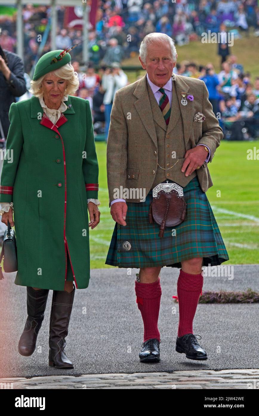 Braemar, Aberdeenshire Scotland, UK. 3rd September 2022. Braemar Royal Highland Gathering 2022. Mass Pipe Bands and highland games kept a capacity audience entertained on a dull day but dry. Pictured Prince Charles, Duke and Duchess of Rothesay, Camilla, Prince of Wales Stock Photo