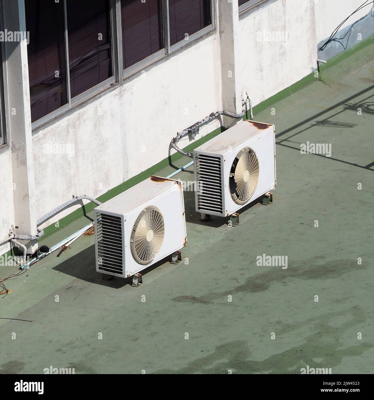 Old air conditioner Compressor on the terrace space and outdoor in