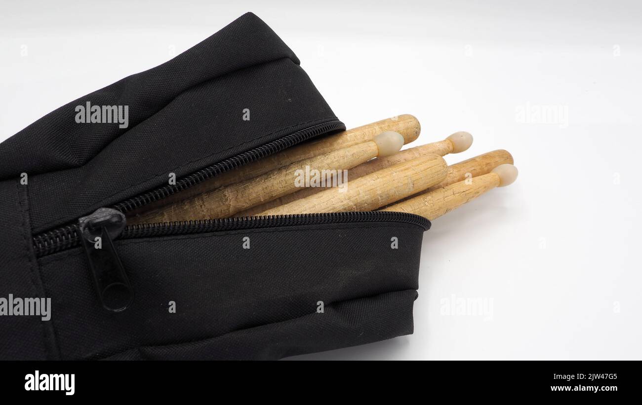 Drum sticks which made from real wood material and black color fabric