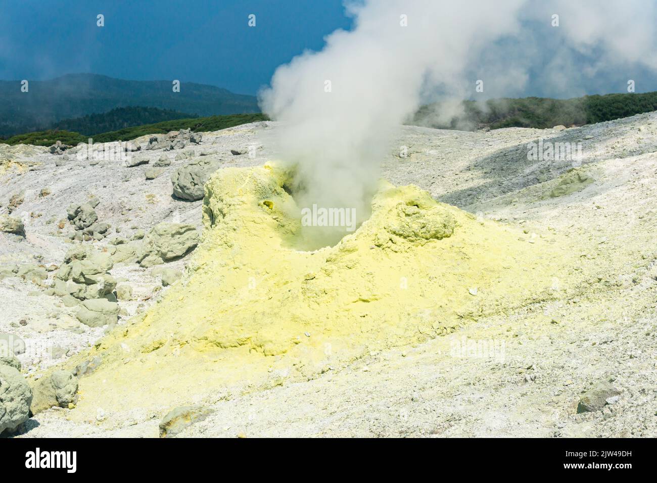 solfatara, source of hot sulfurous gases on the slope of Mendeleev volcano, Kunashir island Stock Photo