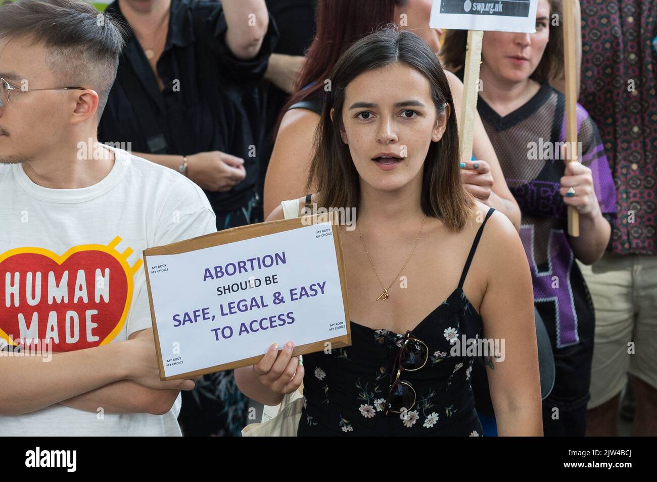 London, UK. 3rd September, 2022. A woman holds a placard as pro-choice supporters stage a demonstration in Parliament Square to campaign for women's reproductive rights around the world as a counter-protest to the anti-abortion 'March for Life'  taking place alongside. The demonstrators also expressed solidarity with women in US where the Supreme Court overturned the 1973 Roe v Wade law, which affirmed the federal constitutional right to seek an abortion. Credit: Wiktor Szymanowicz/Alamy Live News Stock Photo