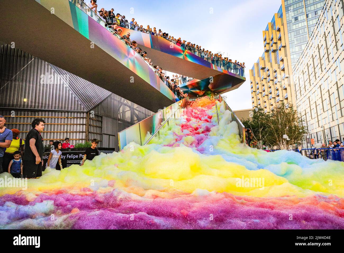 London, UK. 03rd Aug, 2022. People interact with 'Island of Foam