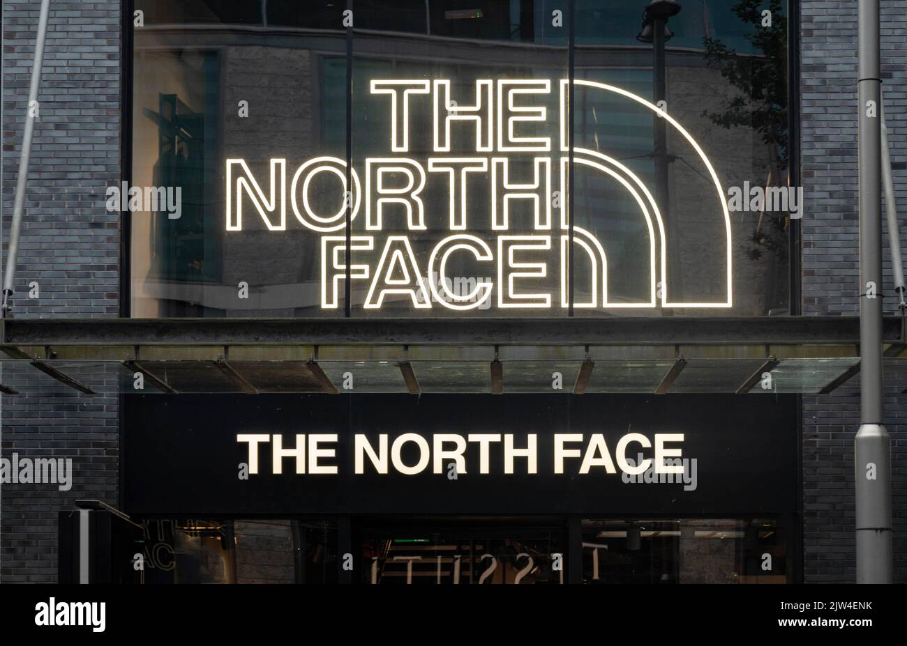 Sign over the entrance to The North Face sports clothing store in Liverpool Stock Photo