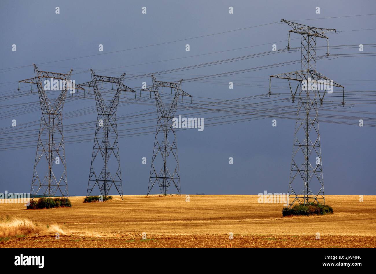 Pylons of high-tension electricity power lines are pictured near Villers-la-Montagne in France, September, 3, 2022. REUTERS/Gonzalo Fuentes Stock Photo