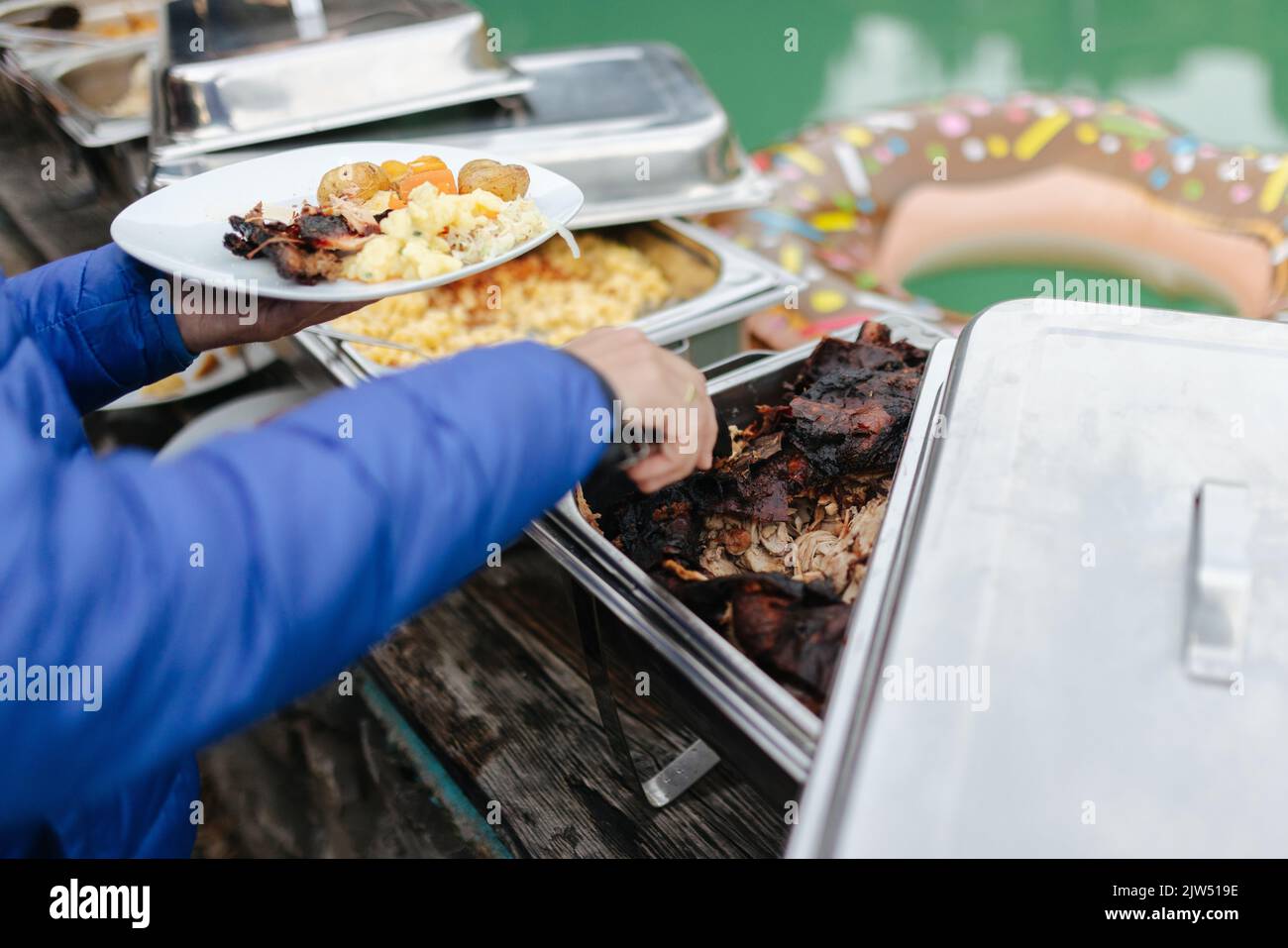 Delicious food in a silver tray at a buffet Stock Photo