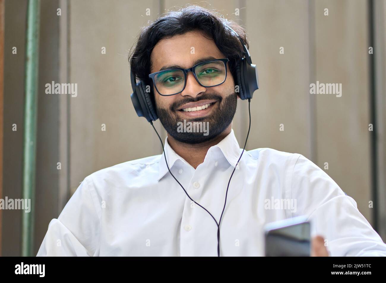 Happy indian business man having hybrid call virtual meeting. Screen view Stock Photo