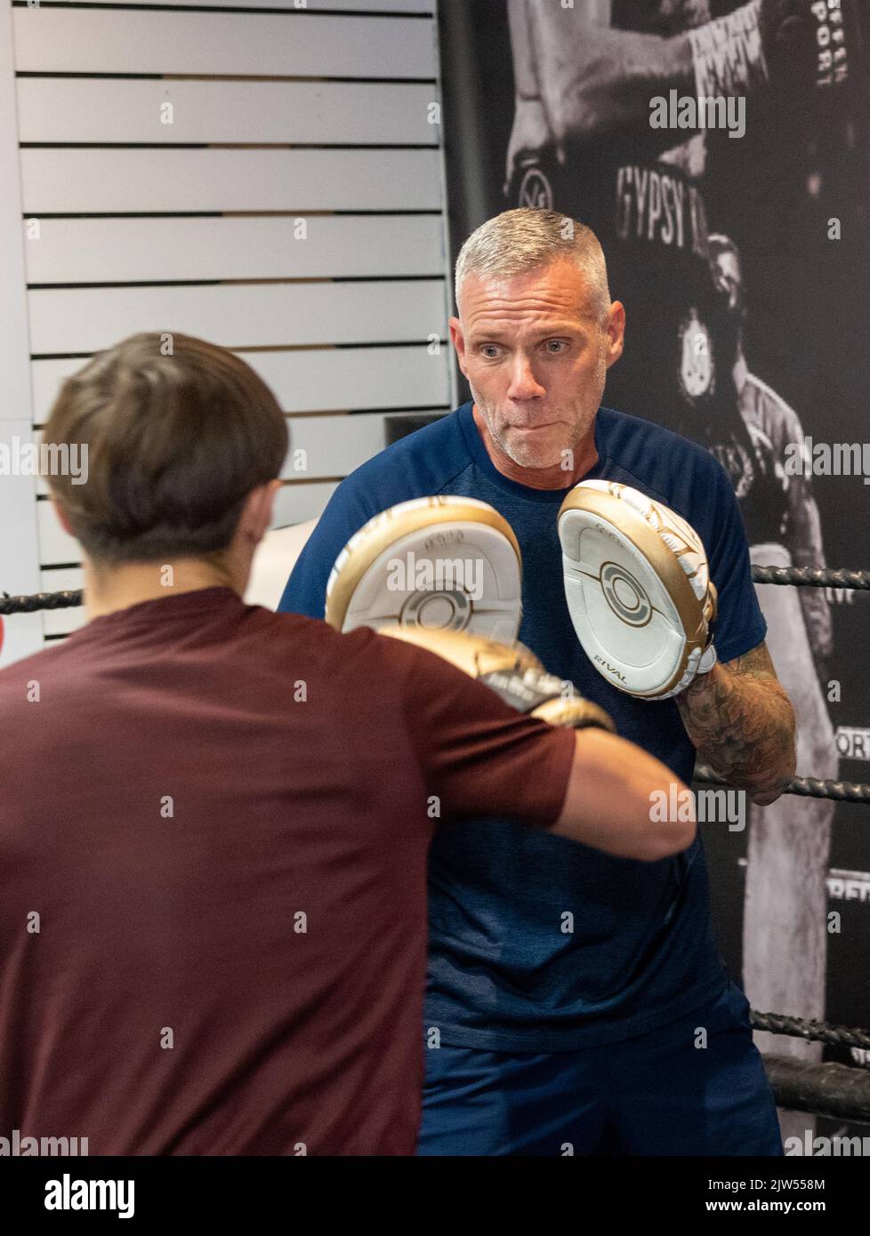 Brentwood Essex 3rd September 2022 Thomas Skinner (The Apprentice and Celebrity Master Chief) opens his latest business venture, the Bosh Gym in Brentwood Essex UK. Chad Ouzman, a boxing instructor tries some sparing Credit: Ian Davidson/Alamy Live News Stock Photo