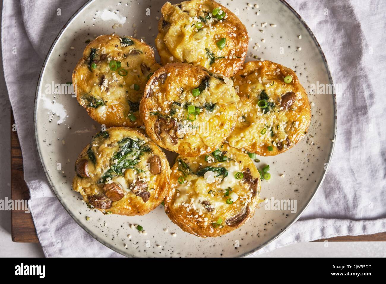 Breakfast Egg muffins with mushroom, spinach and cheese Stock Photo - Alamy