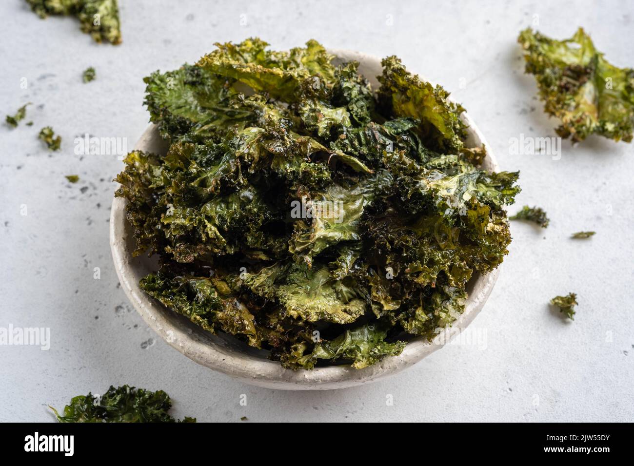 Green Kale Chips with salt and oil Stock Photo Alamy