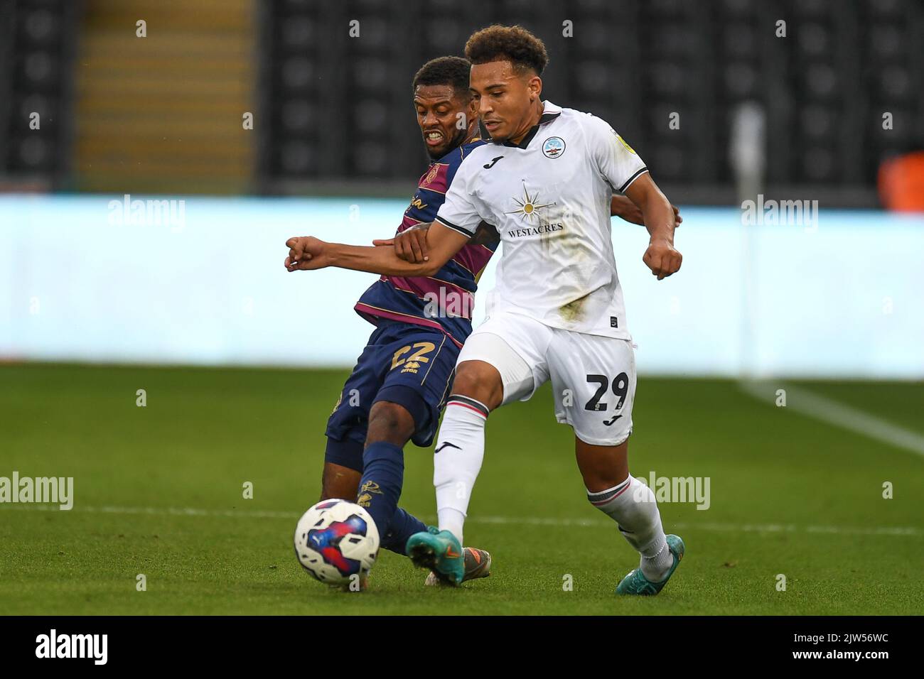 Swansea, UK. 03rd Sep, 2022. Matthew Sorinola #29 of Swansea City Kenneth Paal #22 of QPR during the Sky Bet Championship match Swansea City vs Queens Park Rangers at Swansea.com Stadium, Swansea, United Kingdom, 3rd September 2022 (Photo by Mike Jones/News Images) in Swansea, United Kingdom on 9/3/2022. (Photo by Mike Jones/News Images/Sipa USA) Credit: Sipa USA/Alamy Live News Stock Photo