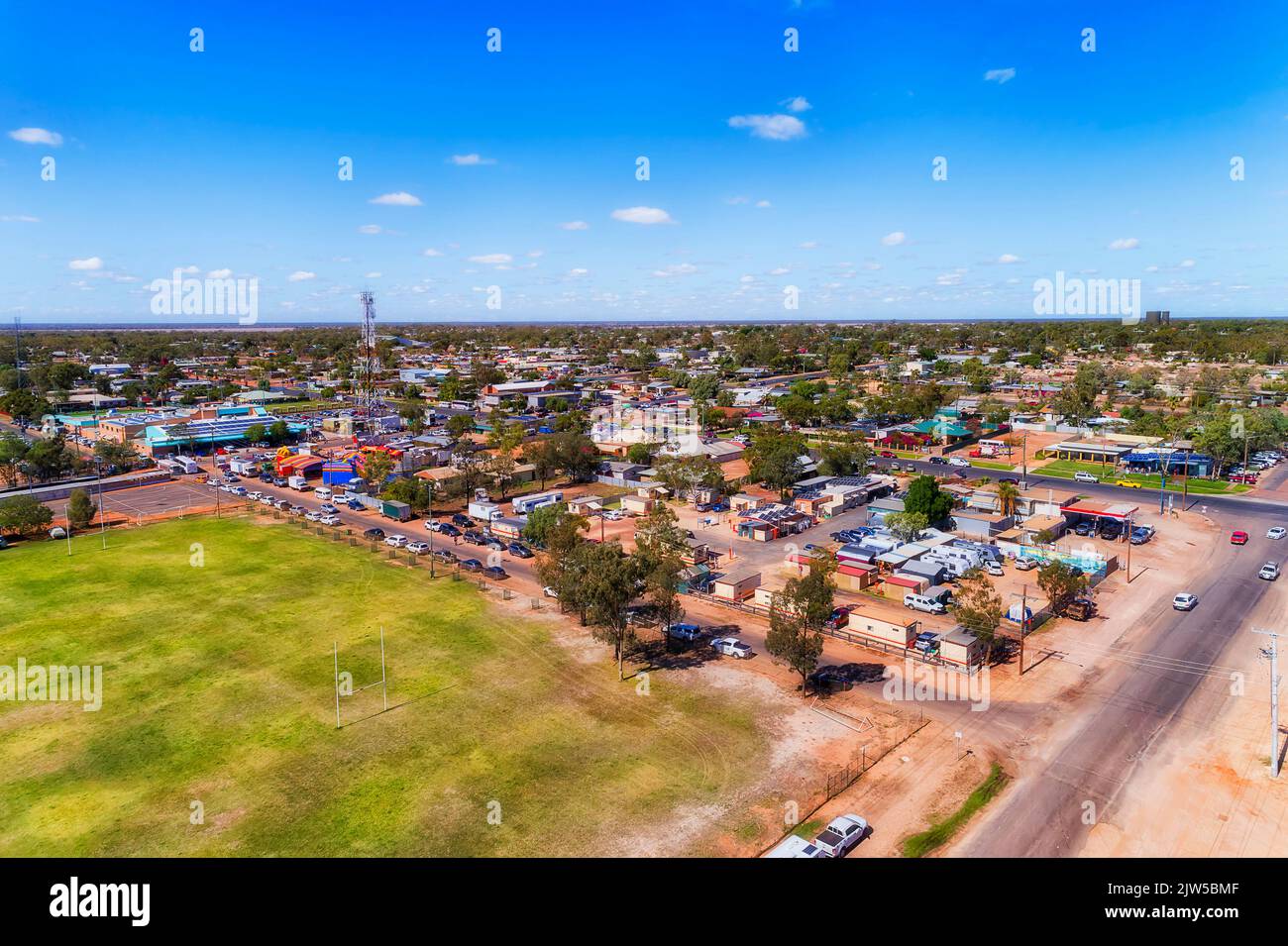 Downtown of Lightning Ridge opal mining town in rural regional outback of NSW, Australia - aerial townscape view. Stock Photo