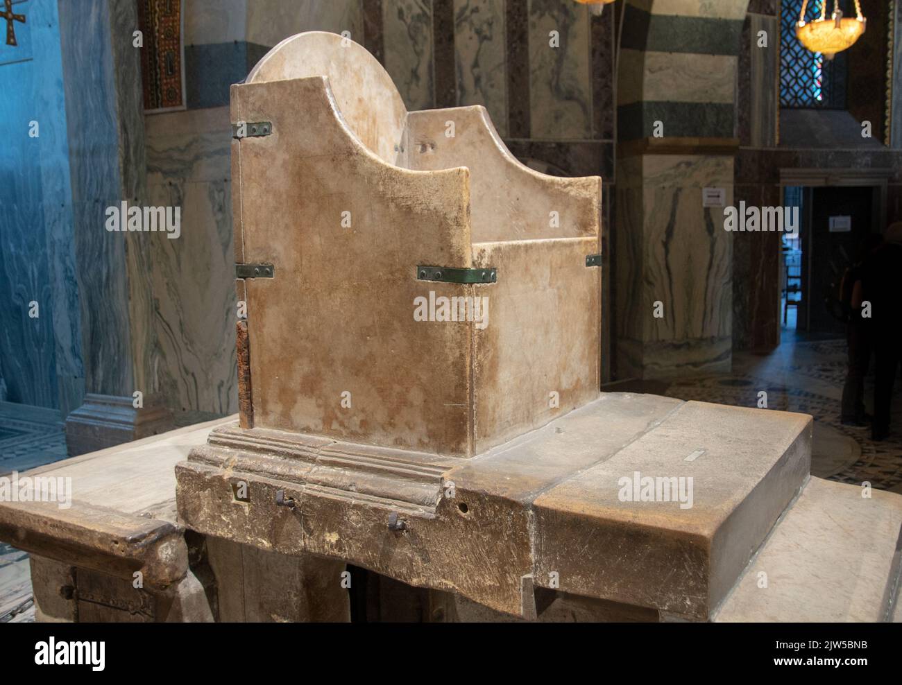 The Aachen royal throne, also known as the throne of Charlemagne, is a throne erected in the 790s on behalf of Emperor Charlemagne, which forms the Stock Photo