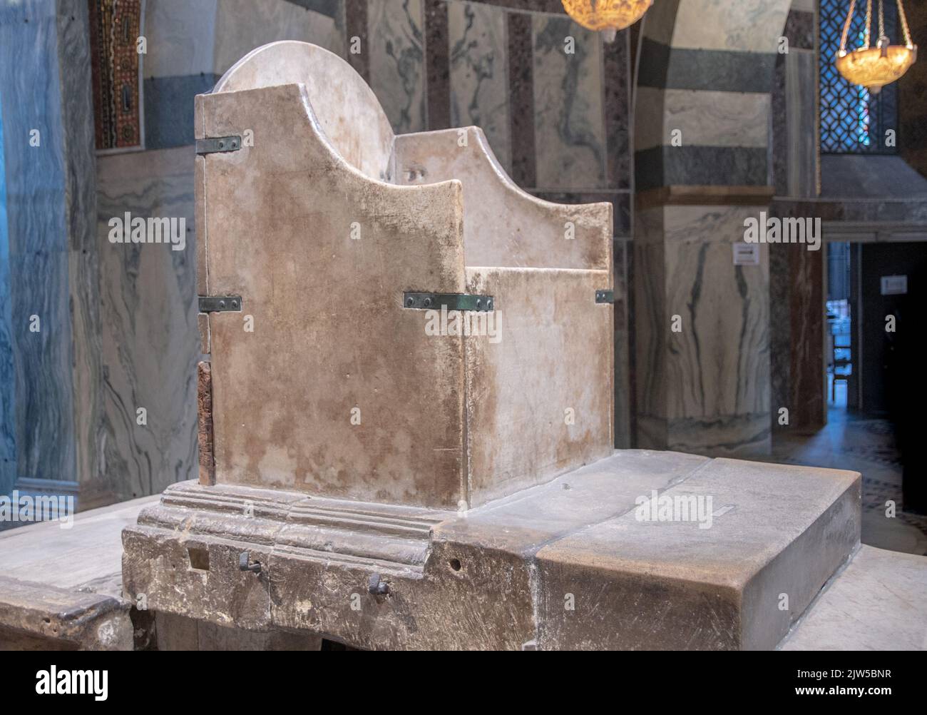 The Aachen royal throne, also known as the throne of Charlemagne, is a throne erected in the 790s on behalf of Emperor Charlemagne, which forms the Stock Photo