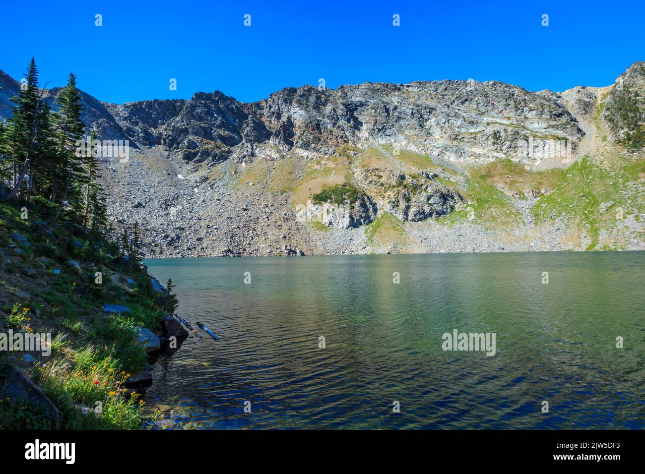 cliff lake below belle point in the tobacco root mountains near mcallister, montana Stock Photo