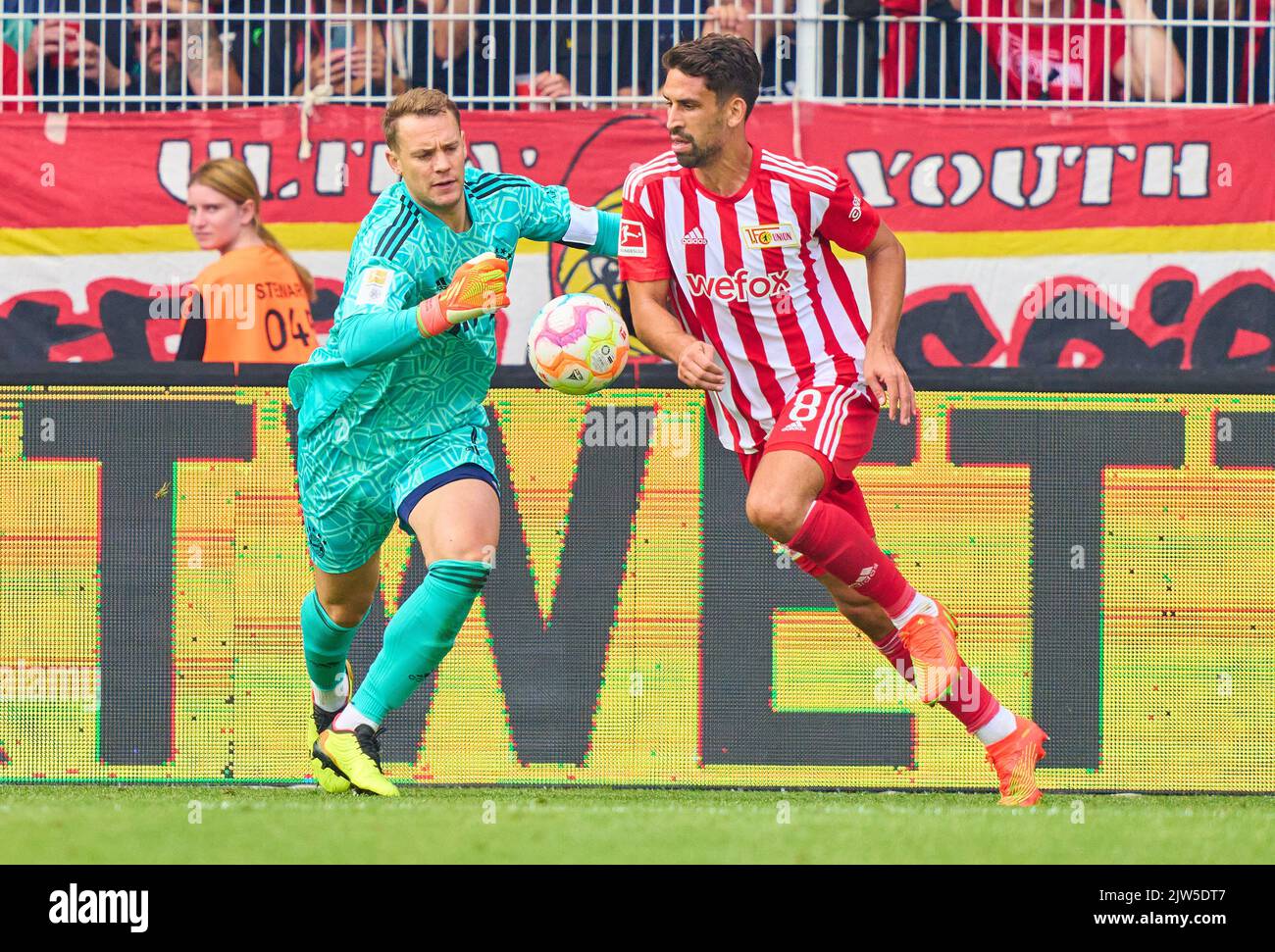 Manuel NEUER, goalkeeper FCB 1   compete for the ball, tackling, duel, header, zweikampf, action, fight against Rani Khedira, Union Berlin 8  in the match 1.FC UNION BERLIN - FC BAYERN MUENCHEN 1-1 1.German Football League on Sept 3, 2022 in Berlin, Germany. Season 2022/2023, matchday 5, 1.Bundesliga, FCB, München, 5.Spieltag. © Peter Schatz / Alamy Live News    - DFL REGULATIONS PROHIBIT ANY USE OF PHOTOGRAPHS as IMAGE SEQUENCES and/or QUASI-VIDEO - Stock Photo