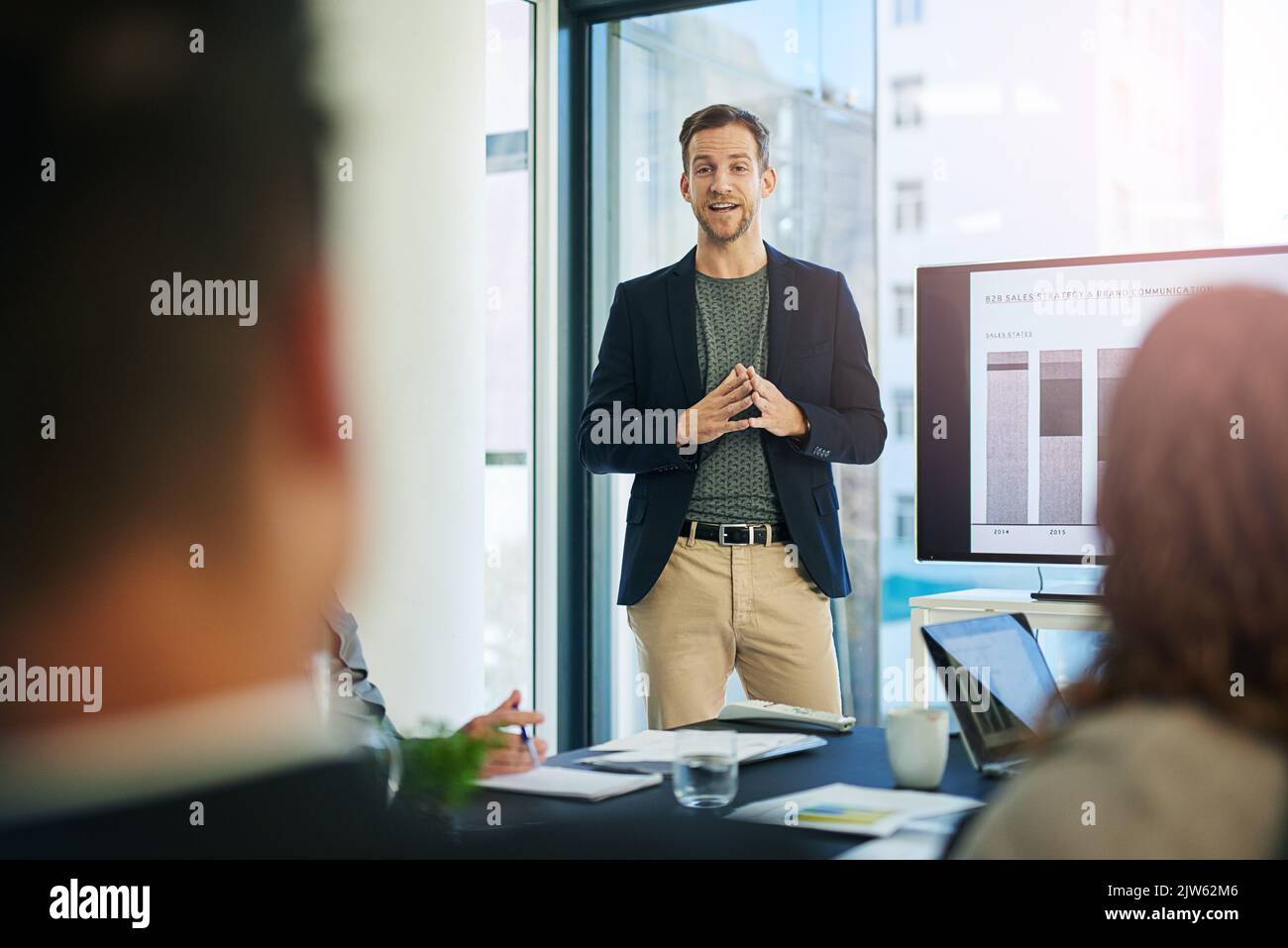 Lemme think it over. a group of businesspeople meeting in the boardroom. Stock Photo