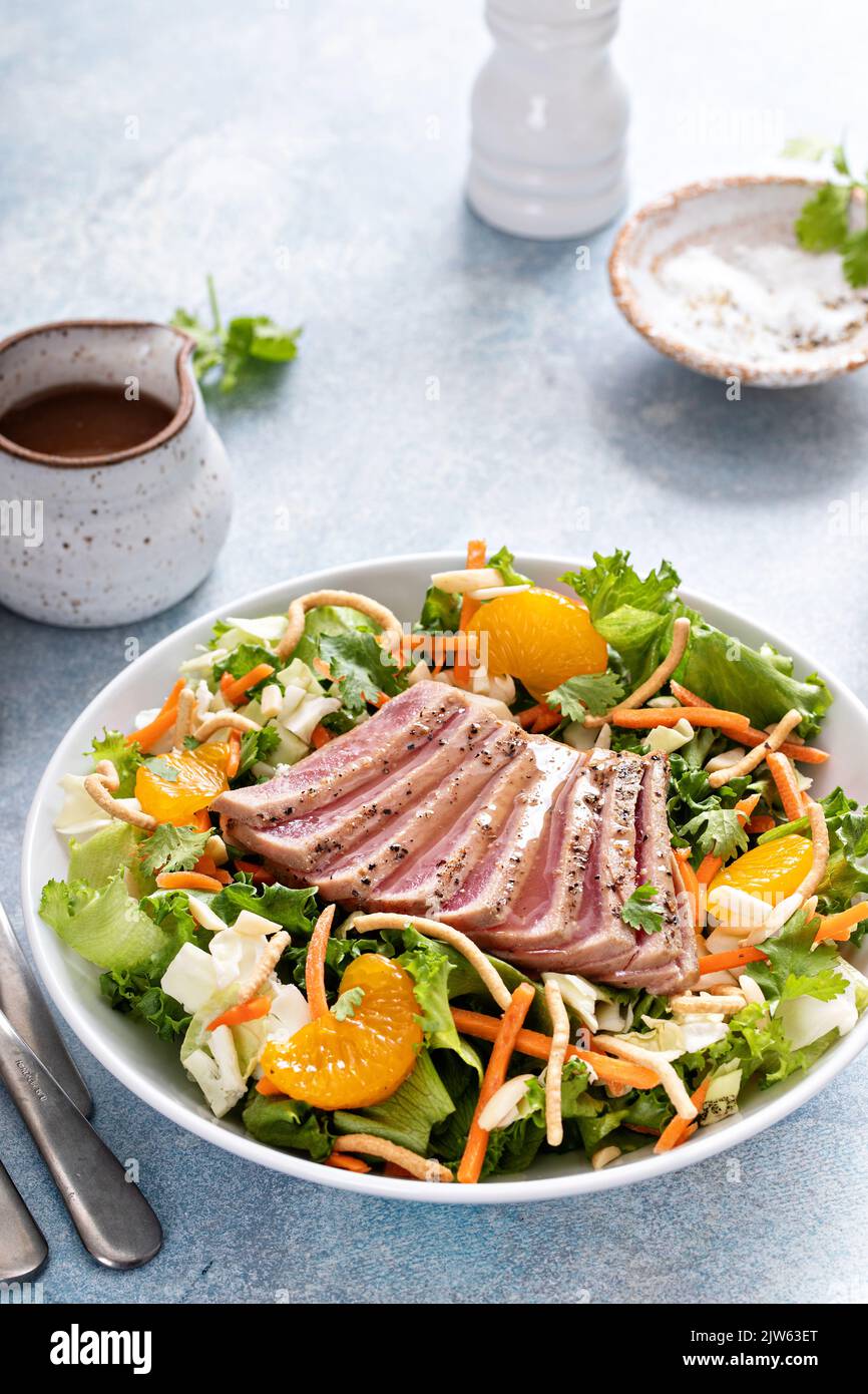 Seared tuna salad with oranges and crunchy noodles Stock Photo