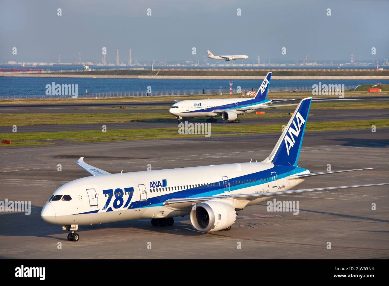 Planes landing and departing at Haneda Airport, Tokyo, Japan Stock