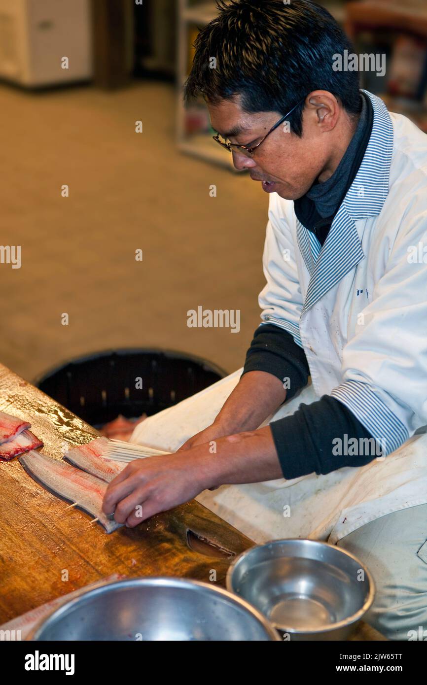 Preparing eel for cooking_Narita_Japan 3 Stock Photo